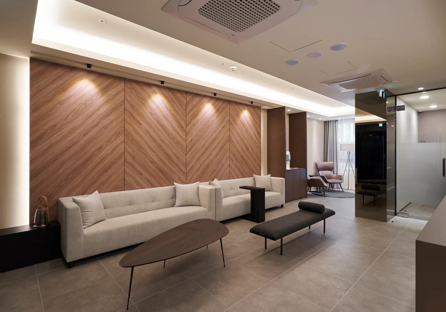 Calm waiting lounge in a Seoul aesthetic clinic